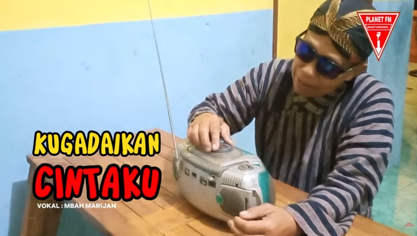 gambar lagu kugaadaikan cintaku, mbah marijan fans planet fm. Paparan Gambar : <p>Lagu Kugadaikan Cintaku vokal Mbah Marijan fans Radio Planet FM Banyuwangi.</p>